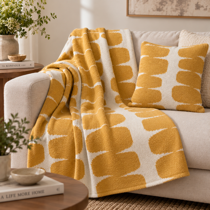 Mustard and lvory Geometric knit Throw.
