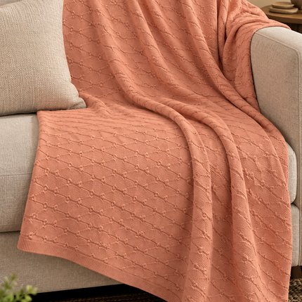 Peach Textured Knit throw.